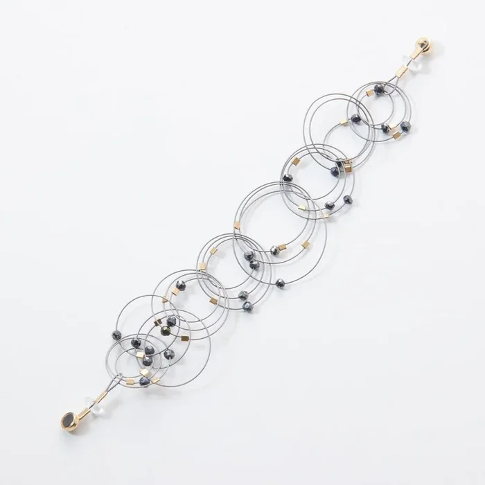 Vertigo Bracelet – Spinel on Steel Cable with Gold Hardware